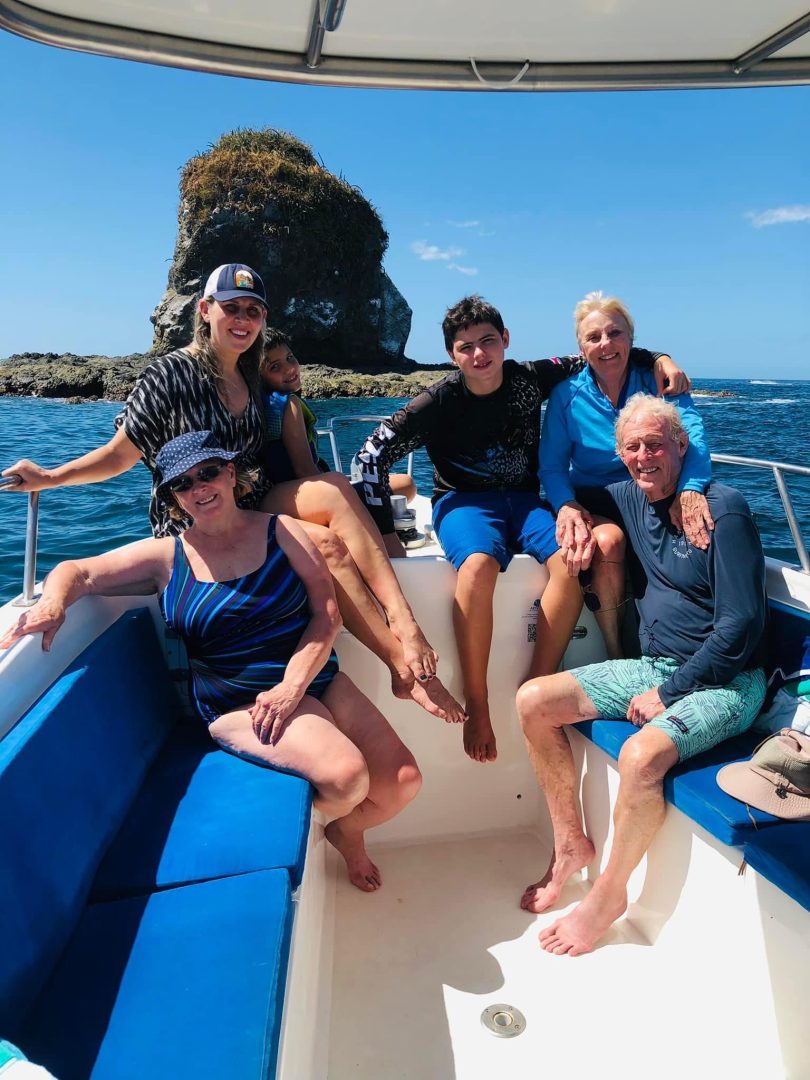 Family on board in pacific ocean costa rica