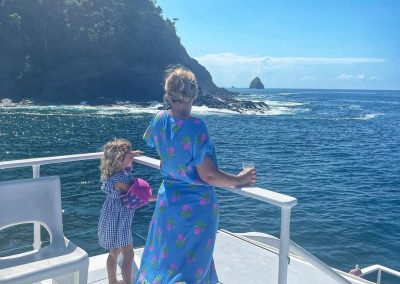 Mom and daughter enyoing a Catamaran Tour in Manuel Antonio, costa Rica