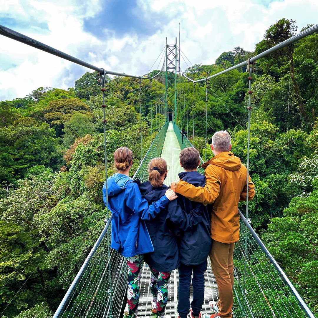 Family walking on hanging bridges