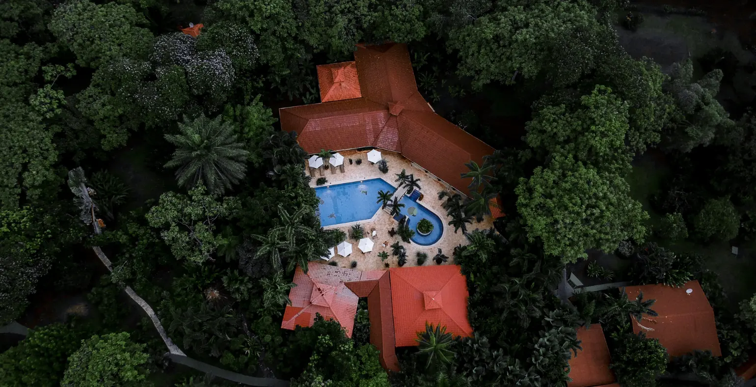 Aerial view of Mawamba Lodge in Tortuguero surrounded by jungle