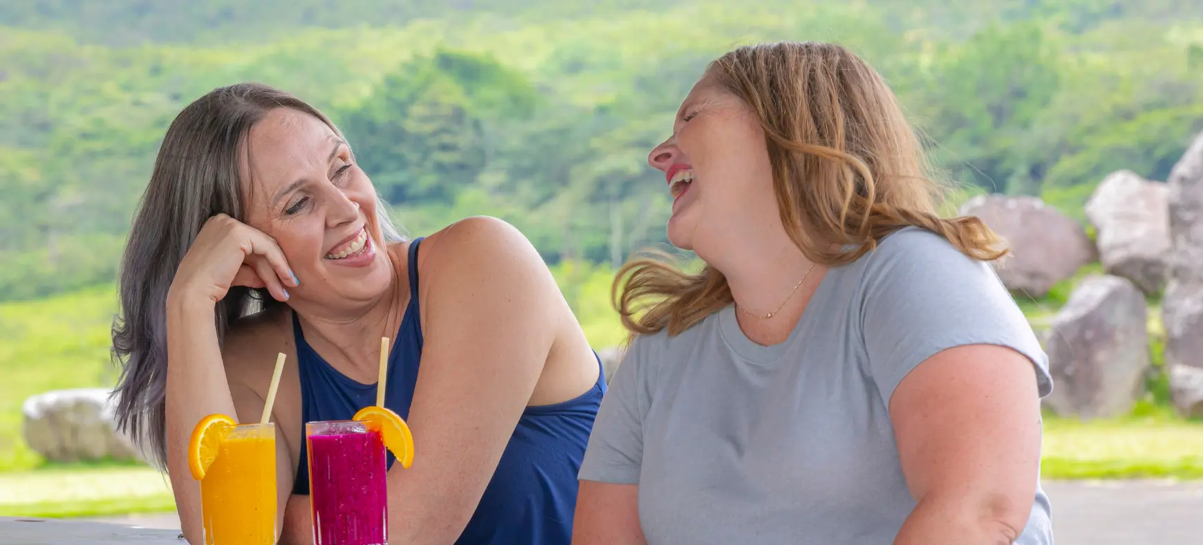 Moms relaxing with drinks during a family vacation in Costa Rica